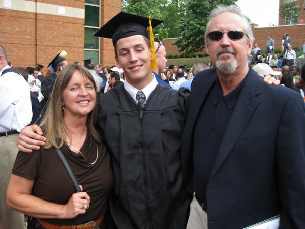 Chris Fitzmaurice with his parents on graduation day from UNC Charlotte